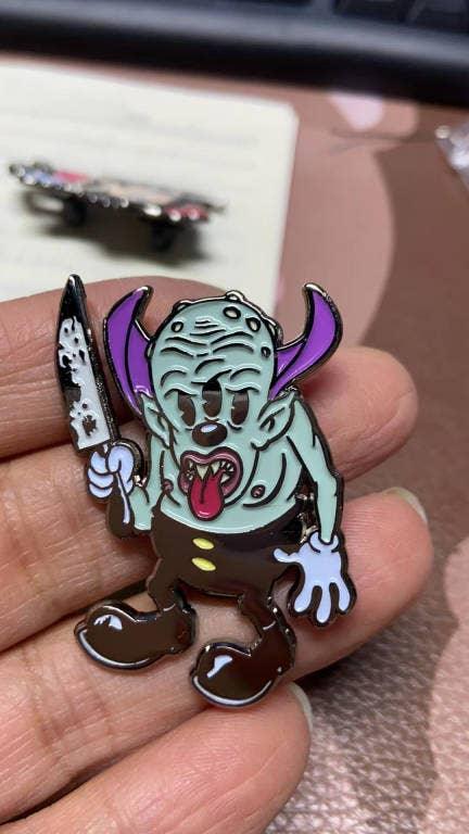 Xeno Pop - Cartoon Creepies Triclops with a Knife 1.75" Soft Enamel pin - Paradise Hobbies LLC